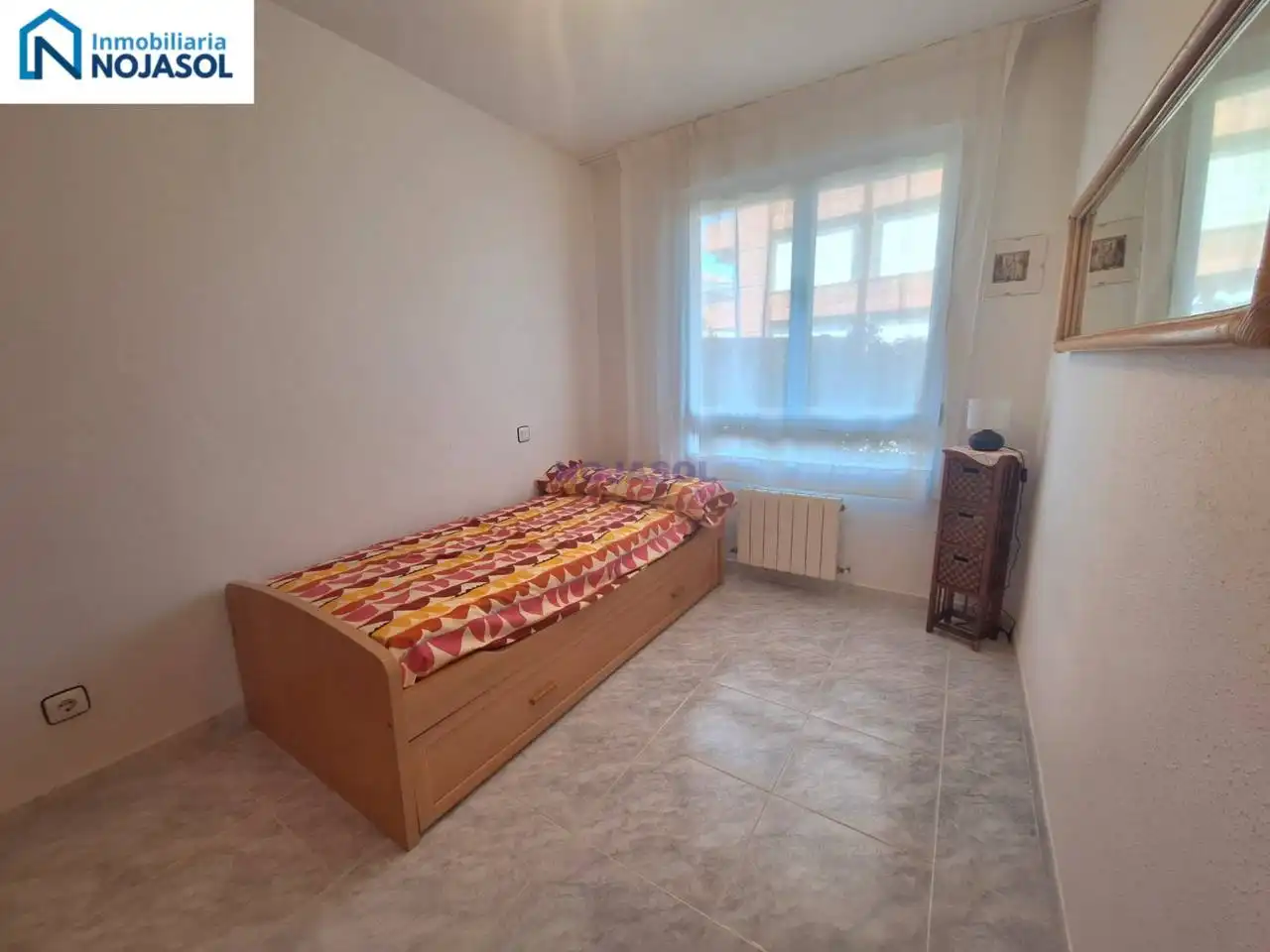 Dormitori de Apartament de lloguer en Noja amb Calefacció, Jardí privat i Terrassa