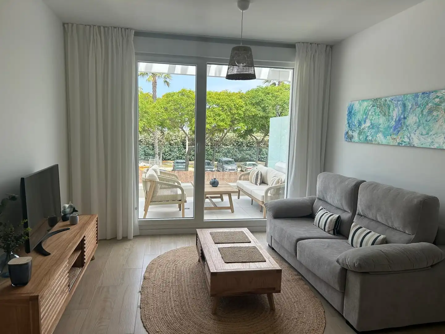 Sala d'estar de Apartament de lloguer en Chipiona amb Aire condicionat, Calefacció i Terrassa