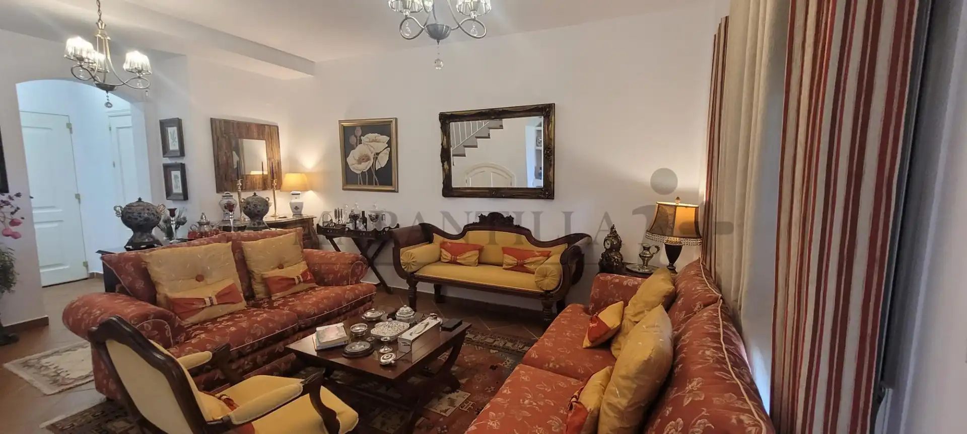 Sala de estar de Casa adosada en venta en Islantilla con Aire acondicionado, Calefacción y Jardín privado