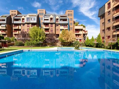 Swimming pool of Flat for sale in  Granada Capital  with Heating, Terrace and Storage room