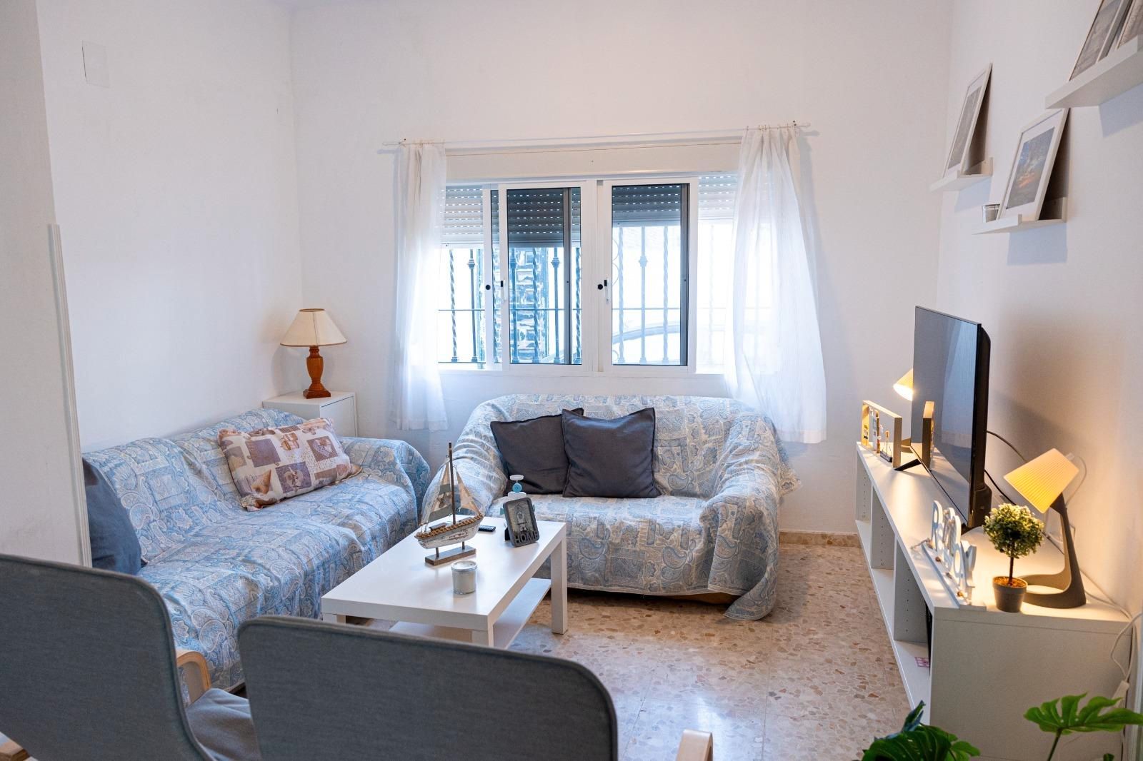 Living room of Single-family semi-detached for sale in Chipiona  with Terrace, Storage room and Furnished
