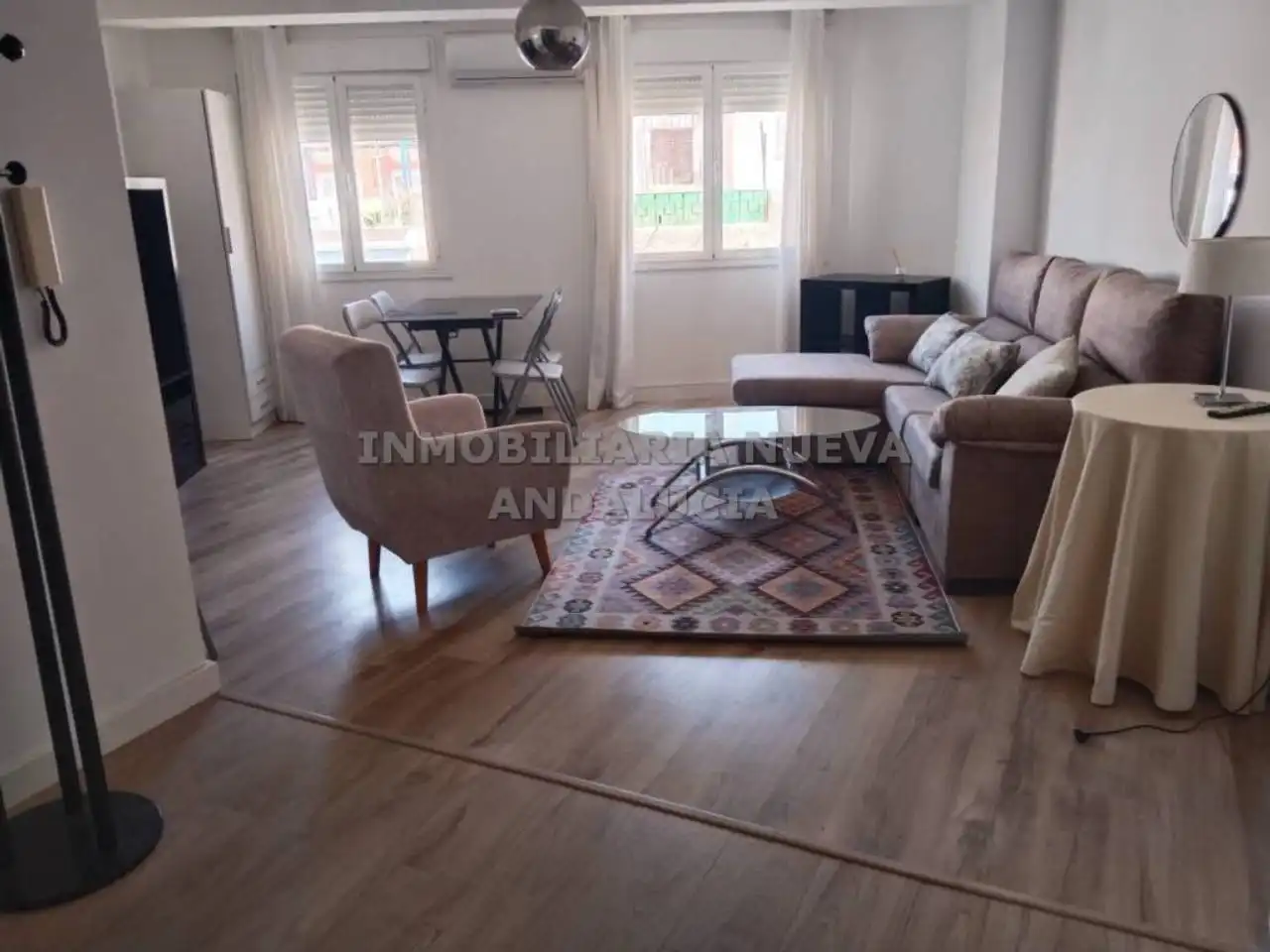 Sala d'estar de Pis de lloguer en Almería amb Aire condicionat i Moblat