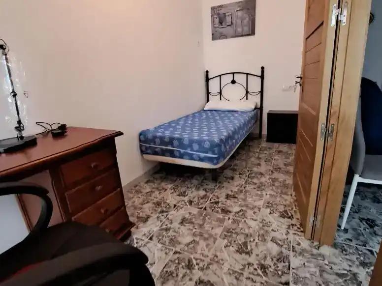 Schlafzimmer von Erdgeschoss zur Miete in Osuna mit Klimaanlage