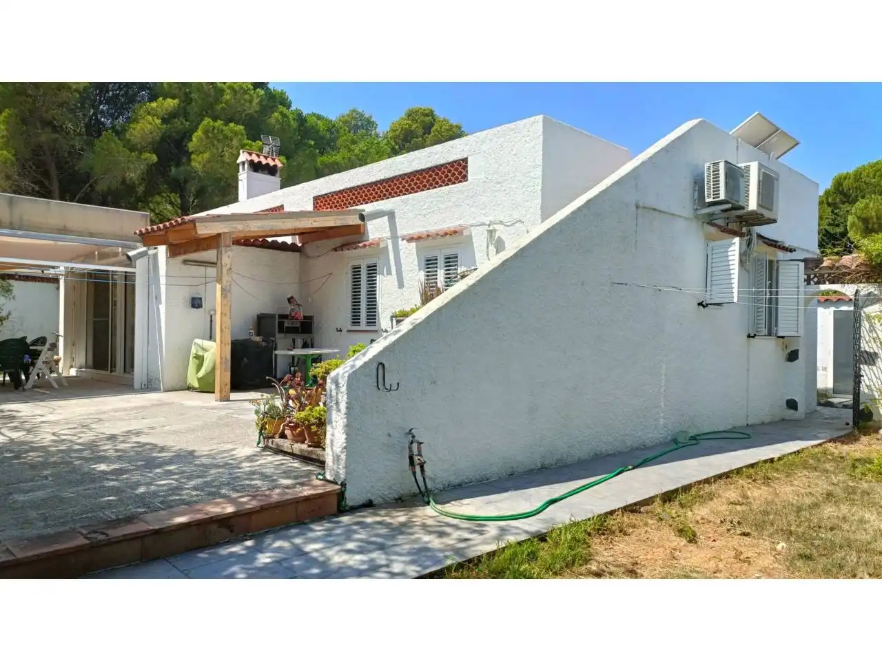 Vista exterior de Casa o chalet en venta en L'Escala con Aire acondicionado, Jardín privado y Terraza