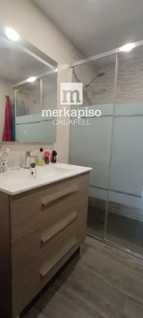 Bathroom of Flat for sale in Calafell  with Air Conditioner, Heating and Terrace