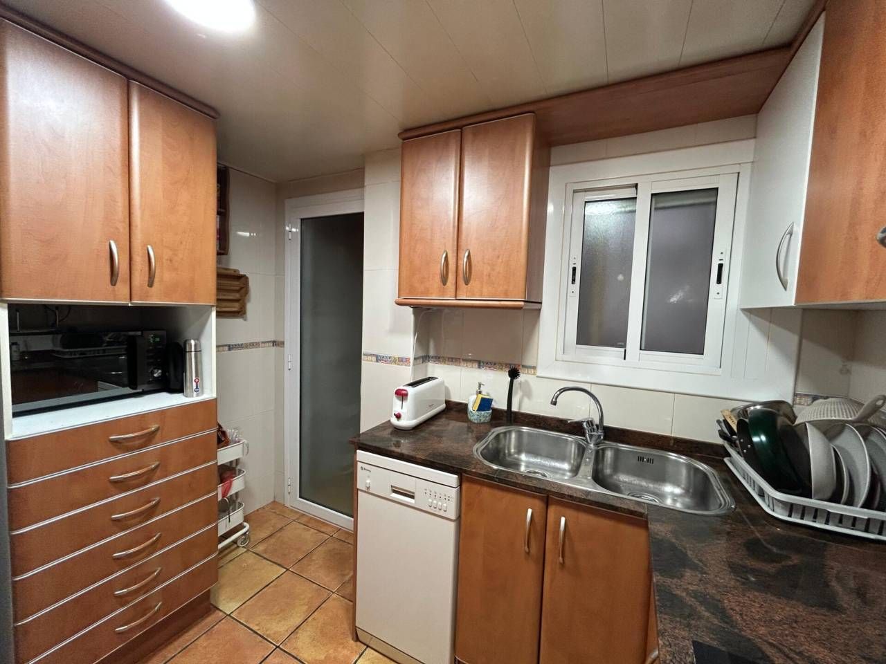 Kitchen of Flat for sale in Vilanova i la Geltrú  with Air Conditioner, Heating and Balcony