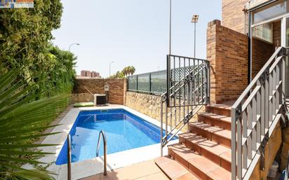 Swimming pool of Single-family semi-detached for sale in  Granada Capital  with Air Conditioner, Terrace and Swimming Pool