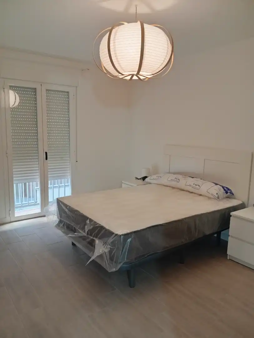 Schlafzimmer von Wohnungen zur Miete in Granada mit Heizung, Möbliert und Waschmaschine