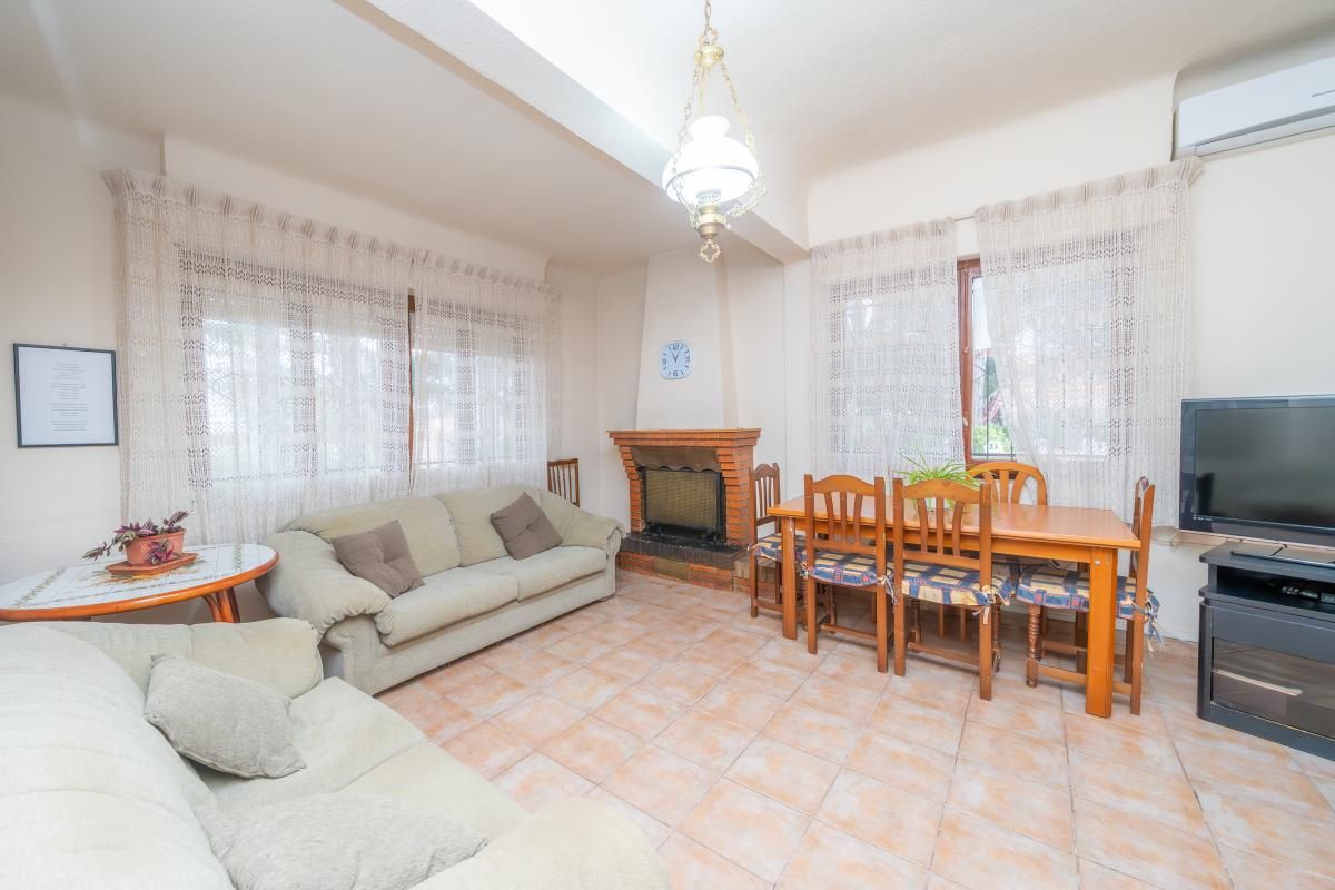 Sala d'estar de Casa o xalet en venda en Elche / Elx amb Calefacció i Piscina