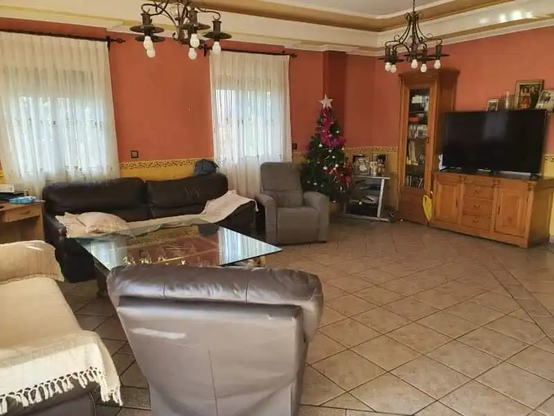 Sala d'estar de Casa o xalet en venda en Alicante / Alacant amb Jardí privat, Terrassa i Piscina