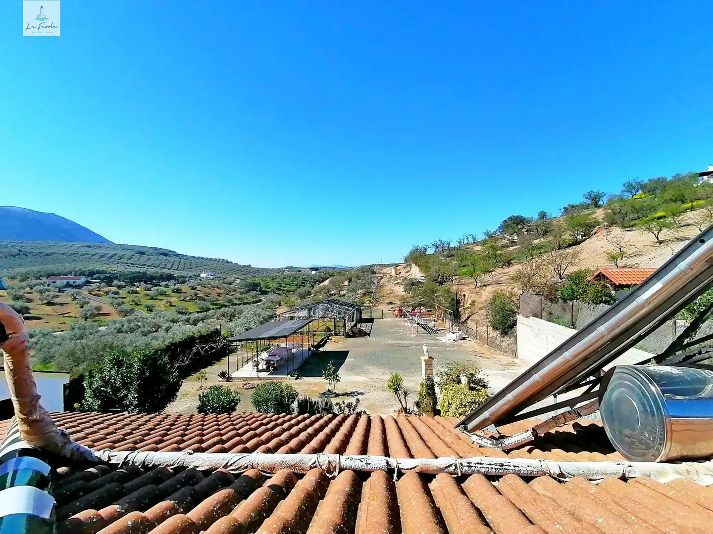 Vista exterior de Casa o xalet en venda en Loja amb Jardí privat, Terrassa i Traster