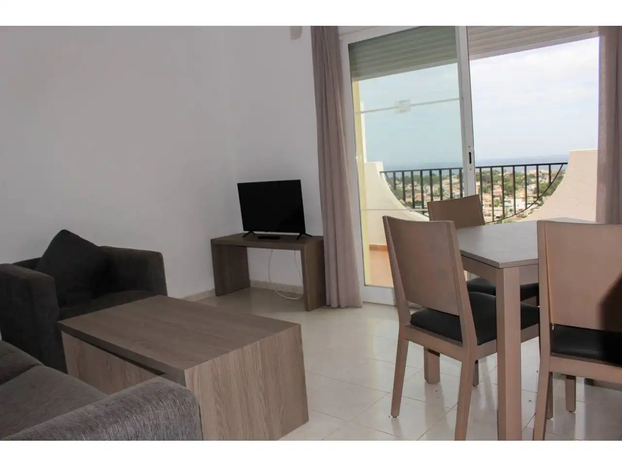 Wohnzimmer von Einfamilien-Reihenhaus zum Verkauf in Calpe / Calp mit Klimaanlage, Terrasse und Möbliert