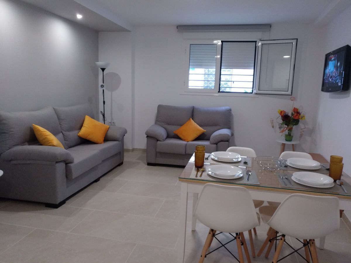 Sala d'estar de Apartament de lloguer en Conil de la Frontera amb Aire condicionat i Moblat