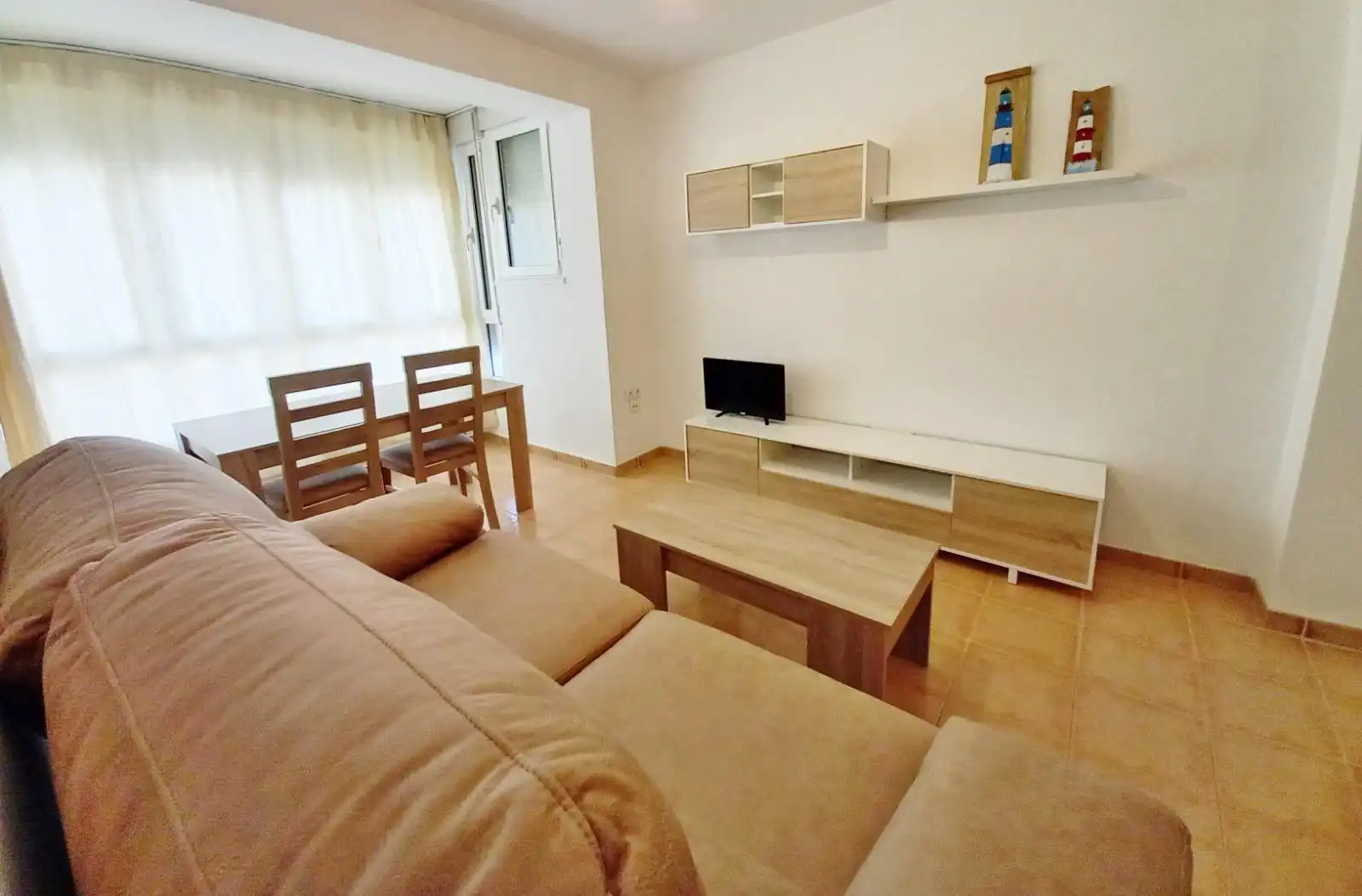 Sala de estar de Apartamento de alquiler en Chiclana de la Frontera con Aire acondicionado y Amueblado