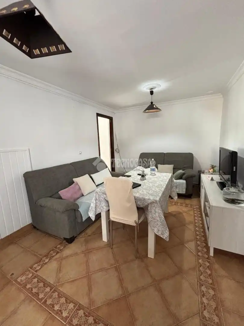 Sala de estar de Casa adosada en venta en Ayamonte con Aire acondicionado y Terraza