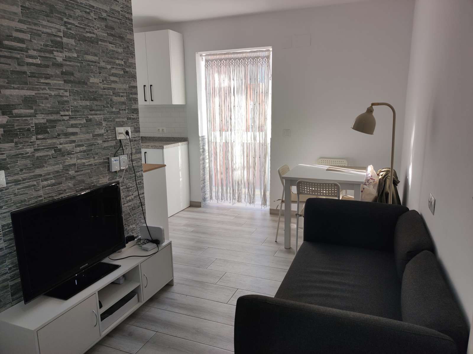 Sala d'estar de Apartament per a compartir en  Granada Capital amb Aire condicionat, Calefacció i Terrassa