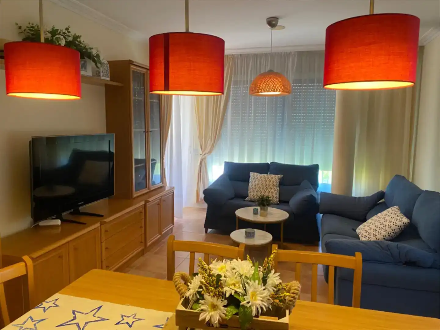 Sala d'estar de Apartament en venda en Sanxenxo amb Jardí privat, Traster i Piscina