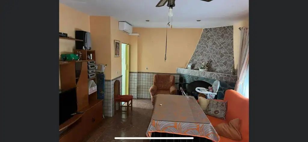 Sala d'estar de Casa o xalet en venda en Loja amb Moblat