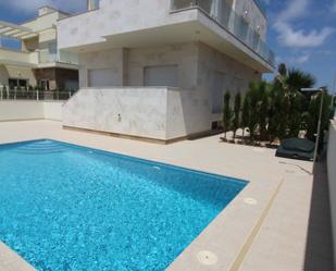 Swimming pool of House or chalet for sale in Orihuela  with Air Conditioner, Heating and Private garden