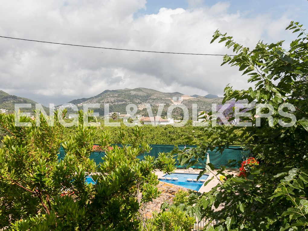 Vista exterior de Casa o xalet en venda en Beniarjó amb Aire condicionat, Calefacció i Jardí privat