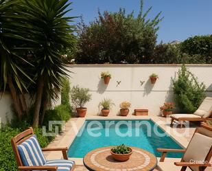 Swimming pool of Single-family semi-detached for sale in Ripollet  with Air Conditioner, Heating and Terrace