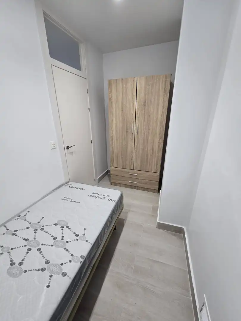 Schlafzimmer von Erdgeschoss zur Miete in Centro