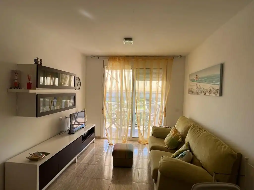 Sala d'estar de Apartament en venda en Alcanar amb Terrassa, Traster i Piscina comunitària
