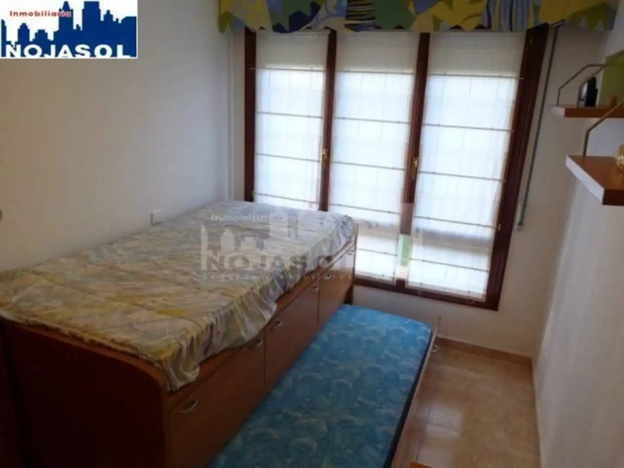 Dormitori de Apartament de lloguer en Noja amb Calefacció, Jardí privat i Terrassa
