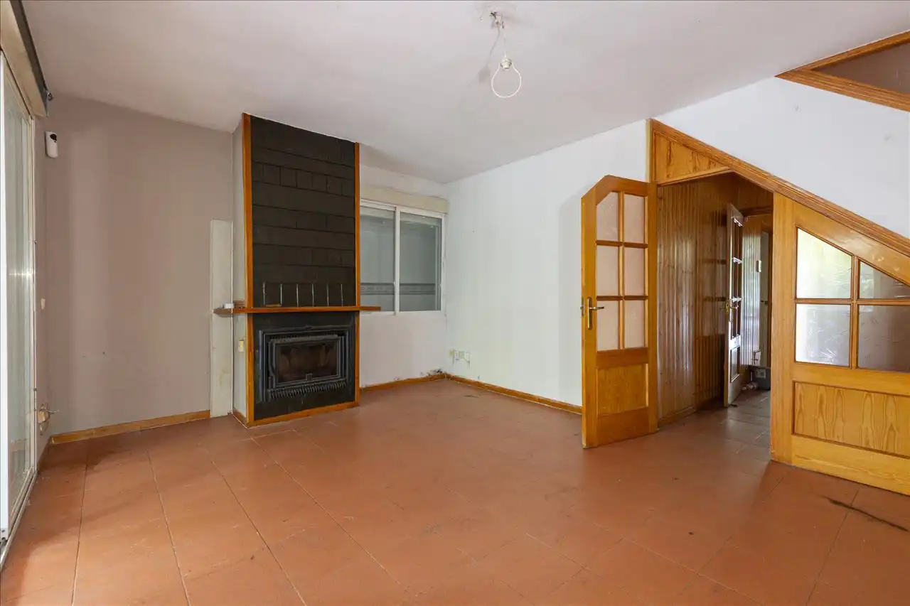 Sala d'estar de Casa adosada en venda en Moralzarzal amb Terrassa i Traster