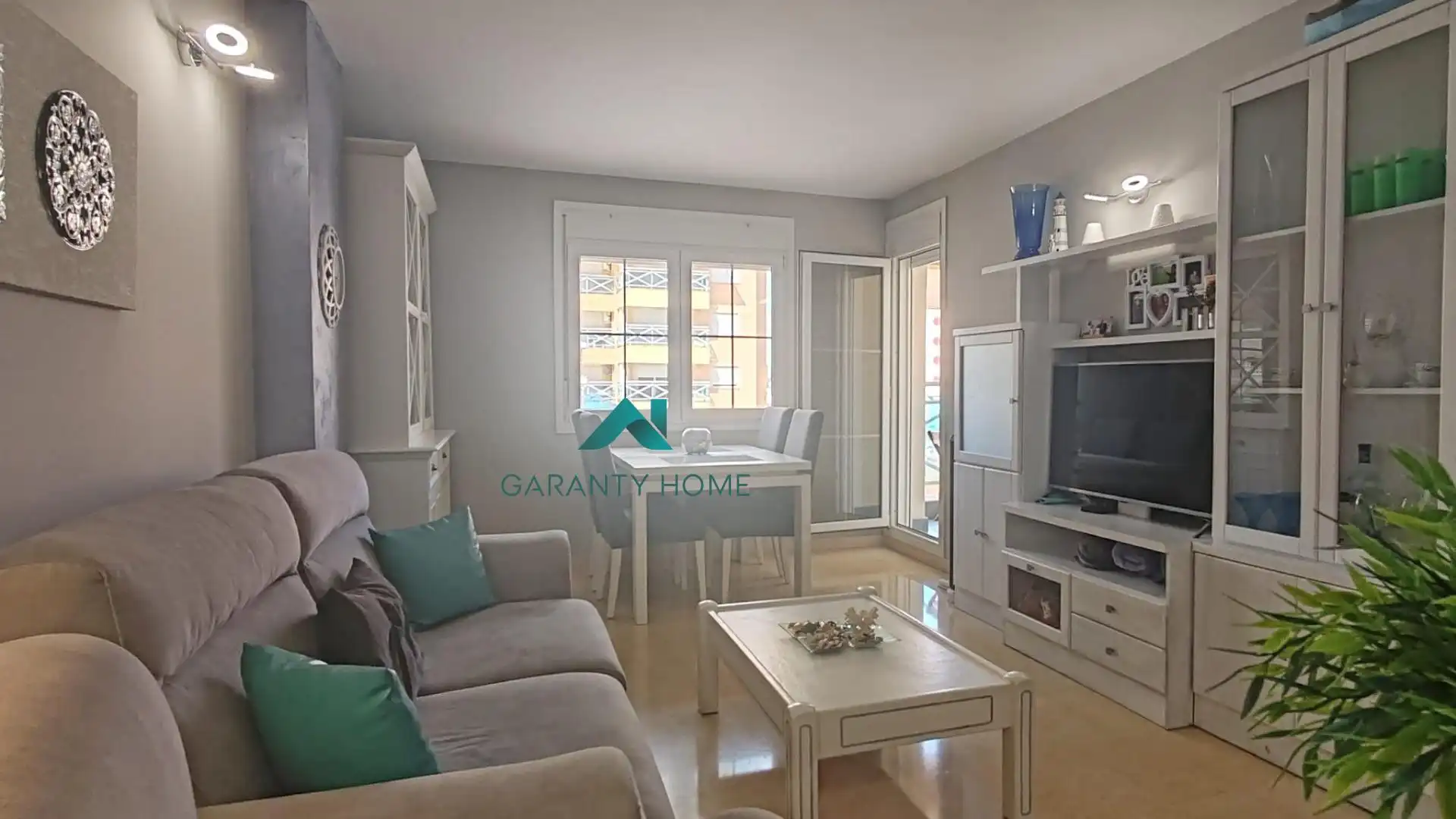 Sala de estar de Apartamento en venta en La Manga del Mar Menor con Aire acondicionado, Jardín privado y Terraza
