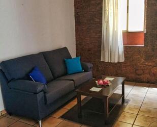 Sala d'estar de Casa adosada en venda en Mislata amb Terrassa i Balcó