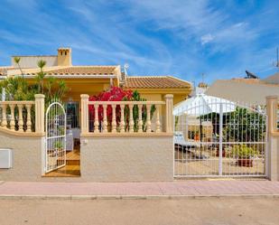 Exterior view of Single-family semi-detached for sale in Torrevieja  with Air Conditioner, Terrace and Community pool