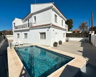 Exterior view of Single-family semi-detached for sale in Paterna  with Air Conditioner, Heating and Private garden