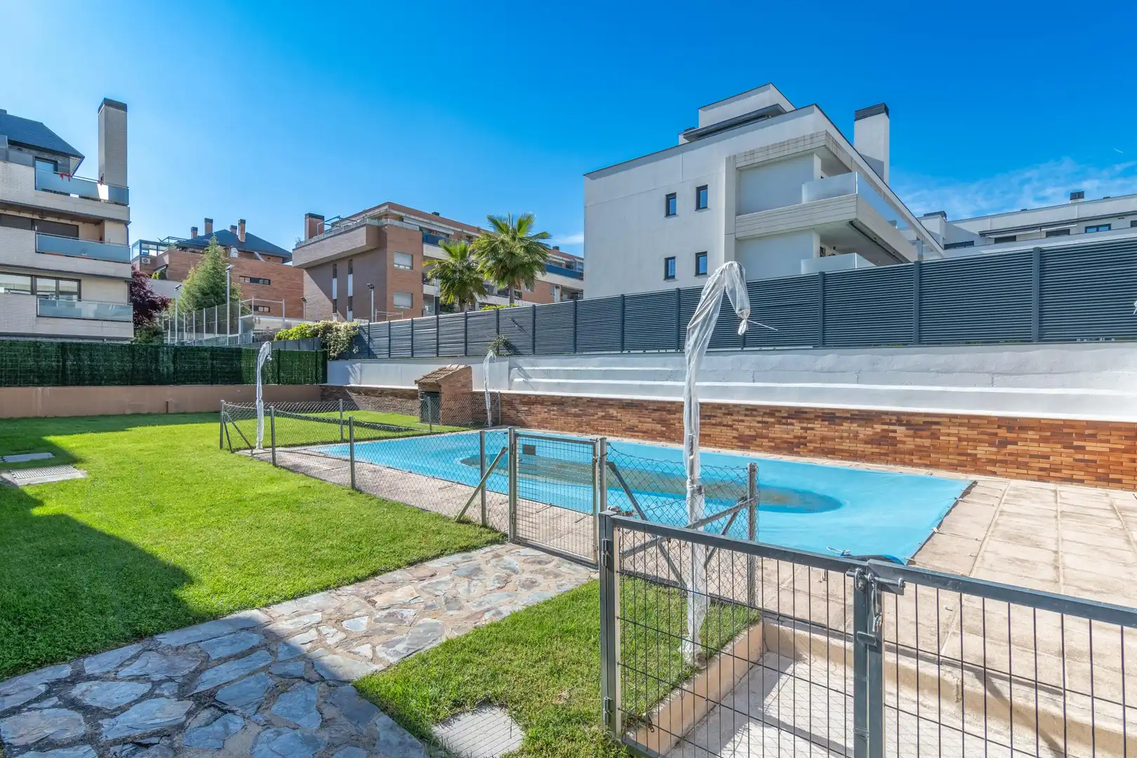 Swimming pool of Apartments for sale in Las Rozas de Madrid  with Air Conditioner, Heating and Private garden