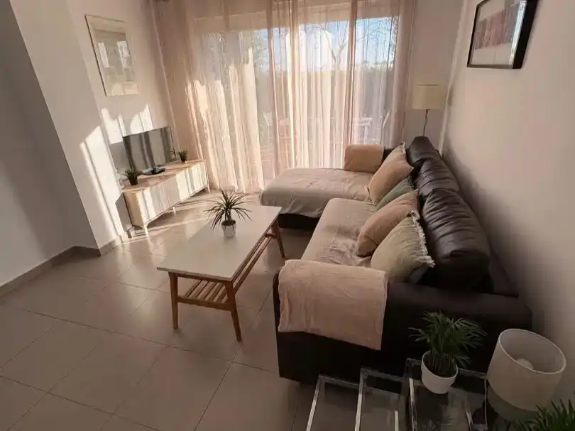 Sala d'estar de Apartament de lloguer en Torre-Pacheco amb Aire condicionat, Jardí privat i Moblat