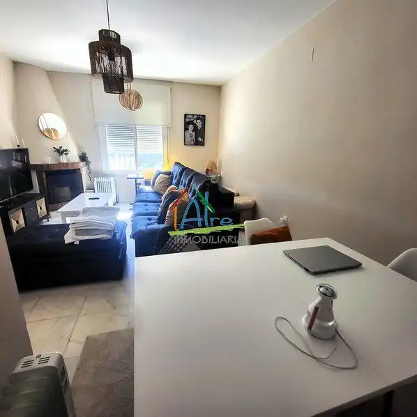 Sala de estar de Casa adosada en venta en Almonte con Aire acondicionado, Calefacción y Jardín privado