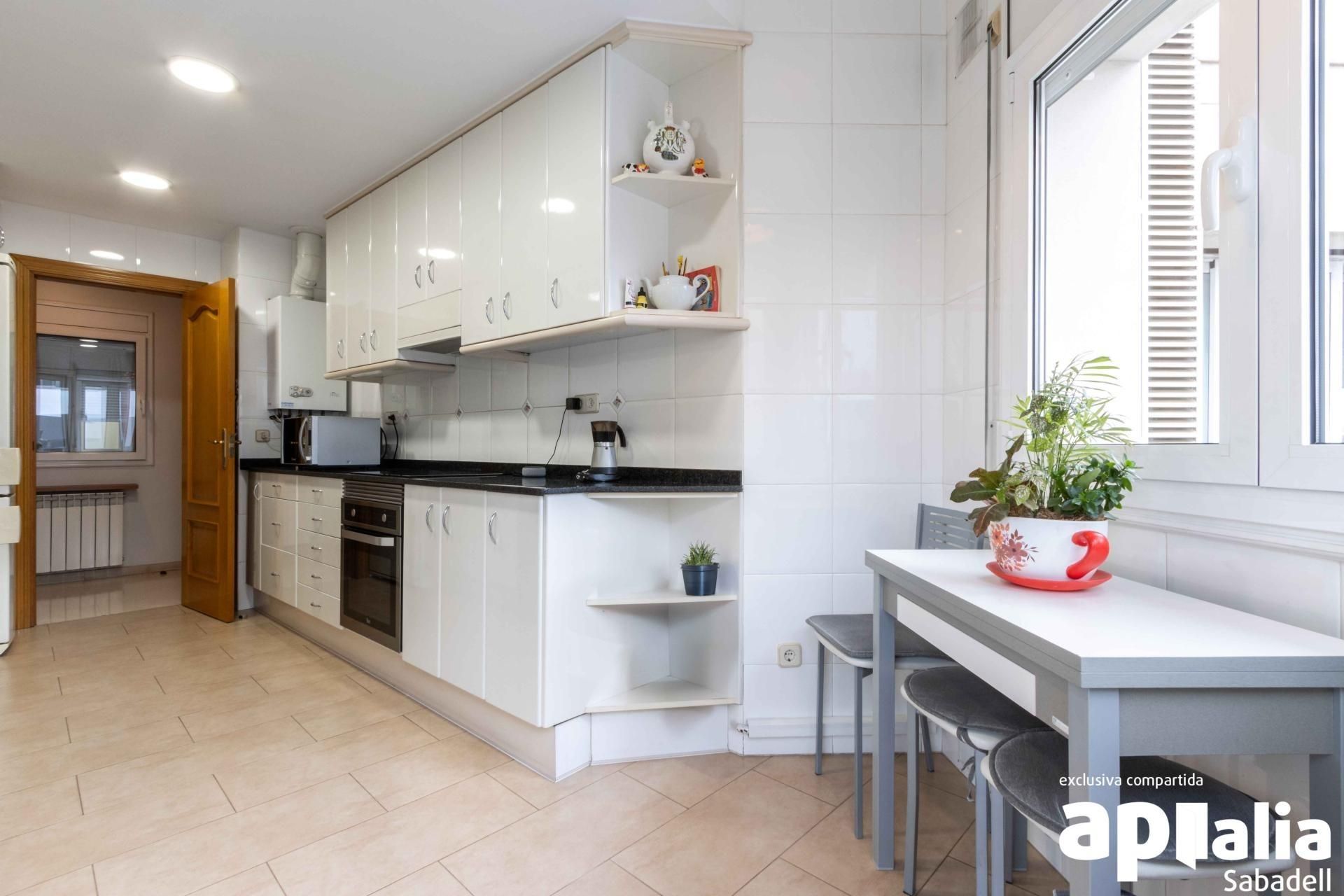 Kitchen of Flat for sale in Sabadell  with Air Conditioner and Balcony