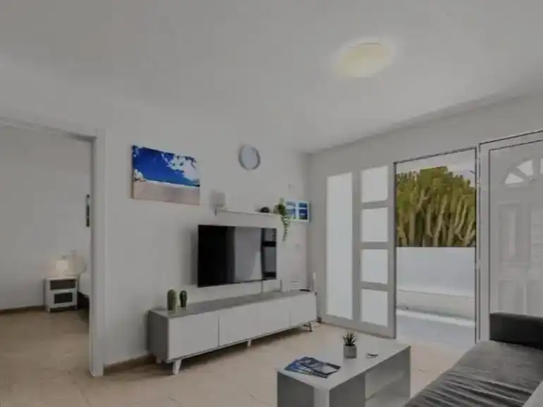 Sala d'estar de Pis en venda en Tías amb Jardí privat i Moblat