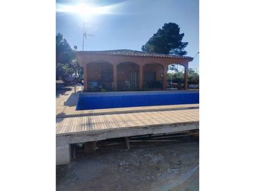 Casa rústica amb piscina en venda a Calle NACIONAL iv