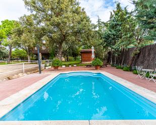 Swimming pool of Country house for sale in Brunete  with Air Conditioner, Heating and Private garden