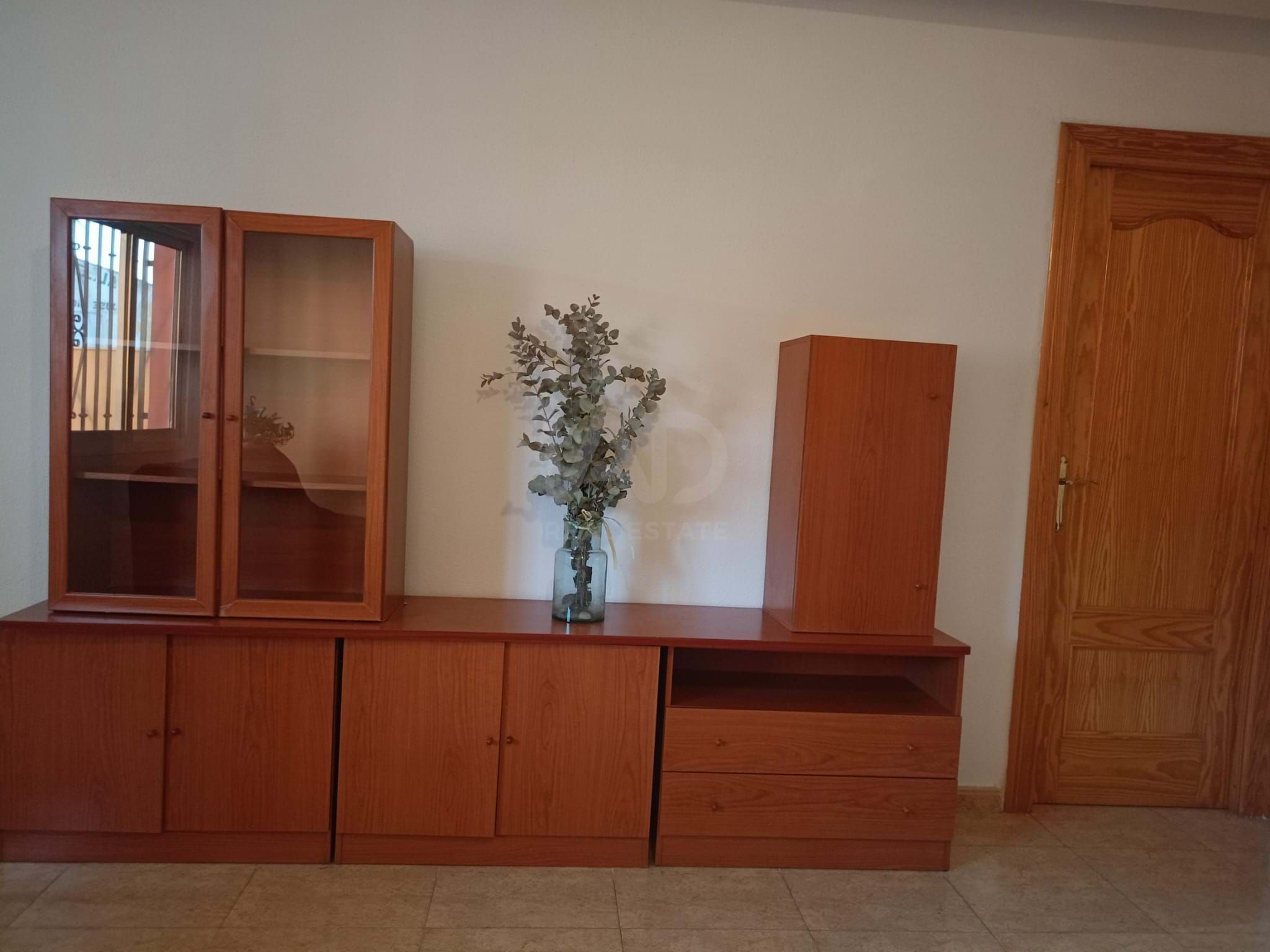 Sala d'estar de Casa adosada en venda en Lorca amb Piscina