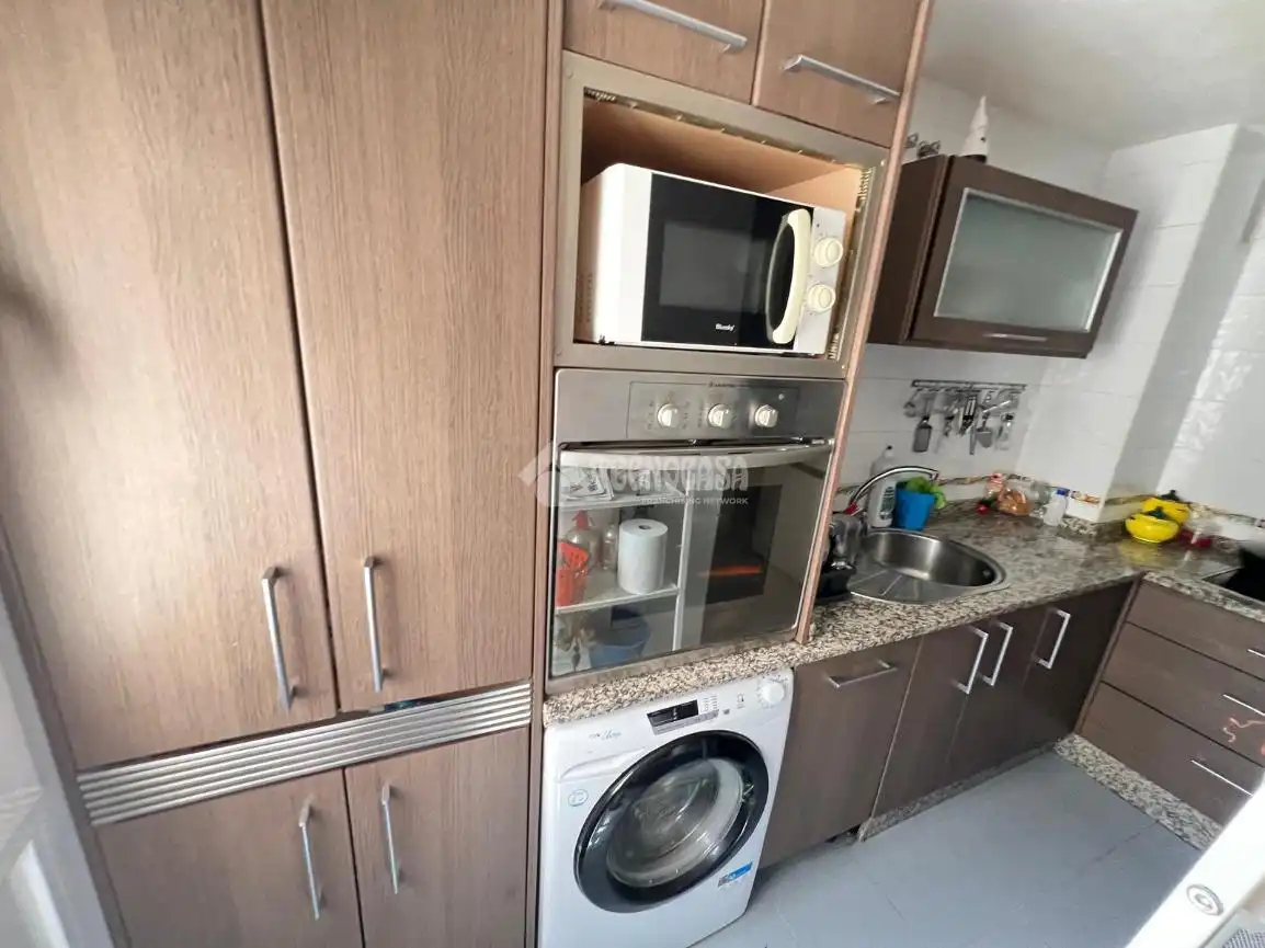 Kitchen of Flat for sale in Dos Hermanas  with Air Conditioner, Heating and Terrace