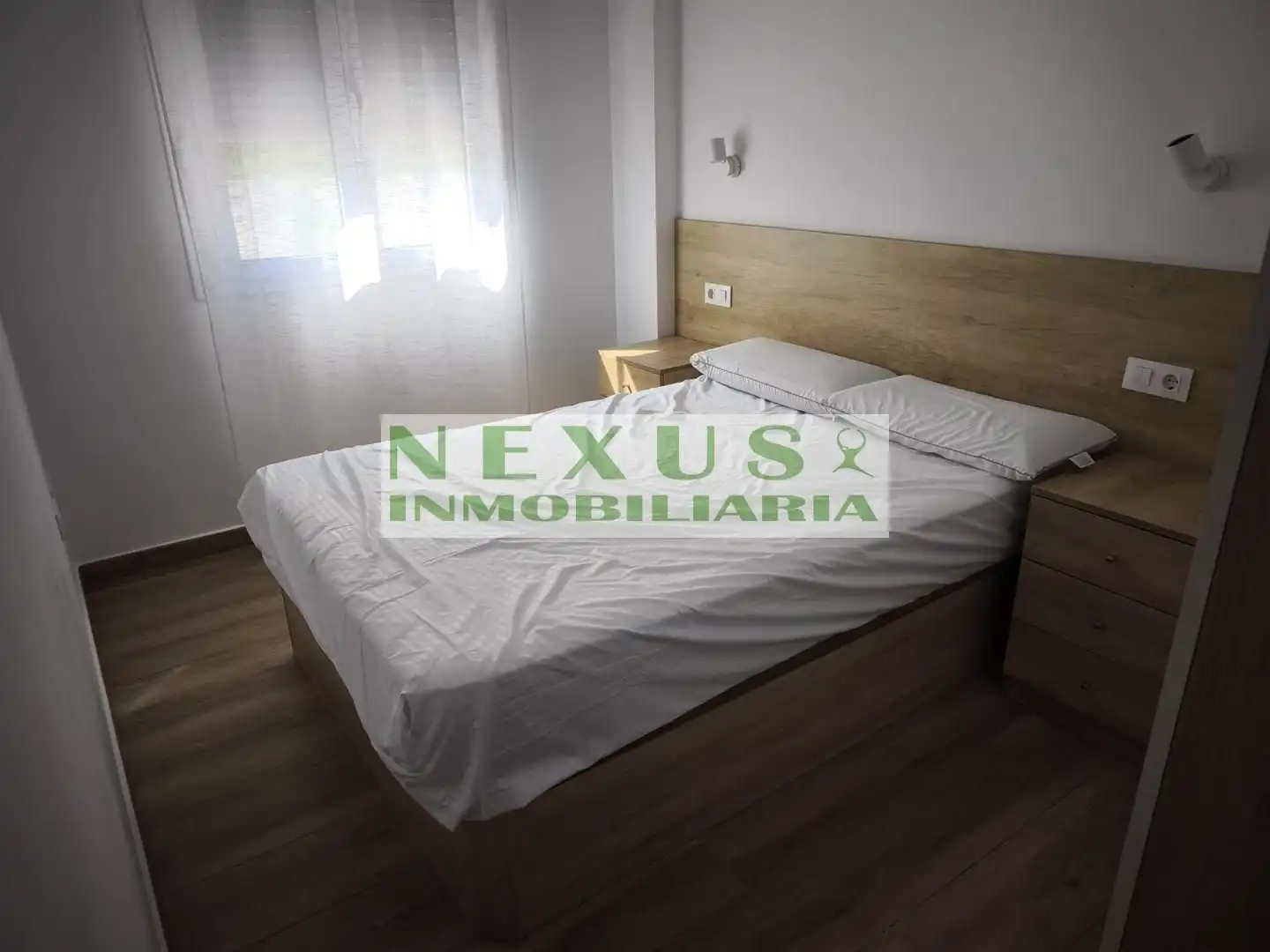 Dormitori de Apartament de lloguer en Cáceres amb Aire condicionat, Calefacció i Moblat