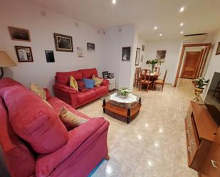 Living room of Planta baja for sale in Mataró  with Air Conditioner, Storage room and Oven