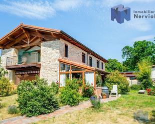 Exterior view of House or chalet for sale in Junta de Villalba de Losa  with Heating, Storage room and Alarm