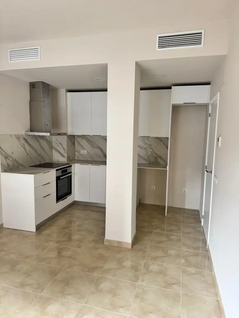 Kitchen of Flat for sale in L'Aldea  with Heating
