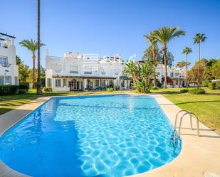 Exterior view of Single-family semi-detached for sale in Marbella  with Air Conditioner, Terrace and Swimming Pool