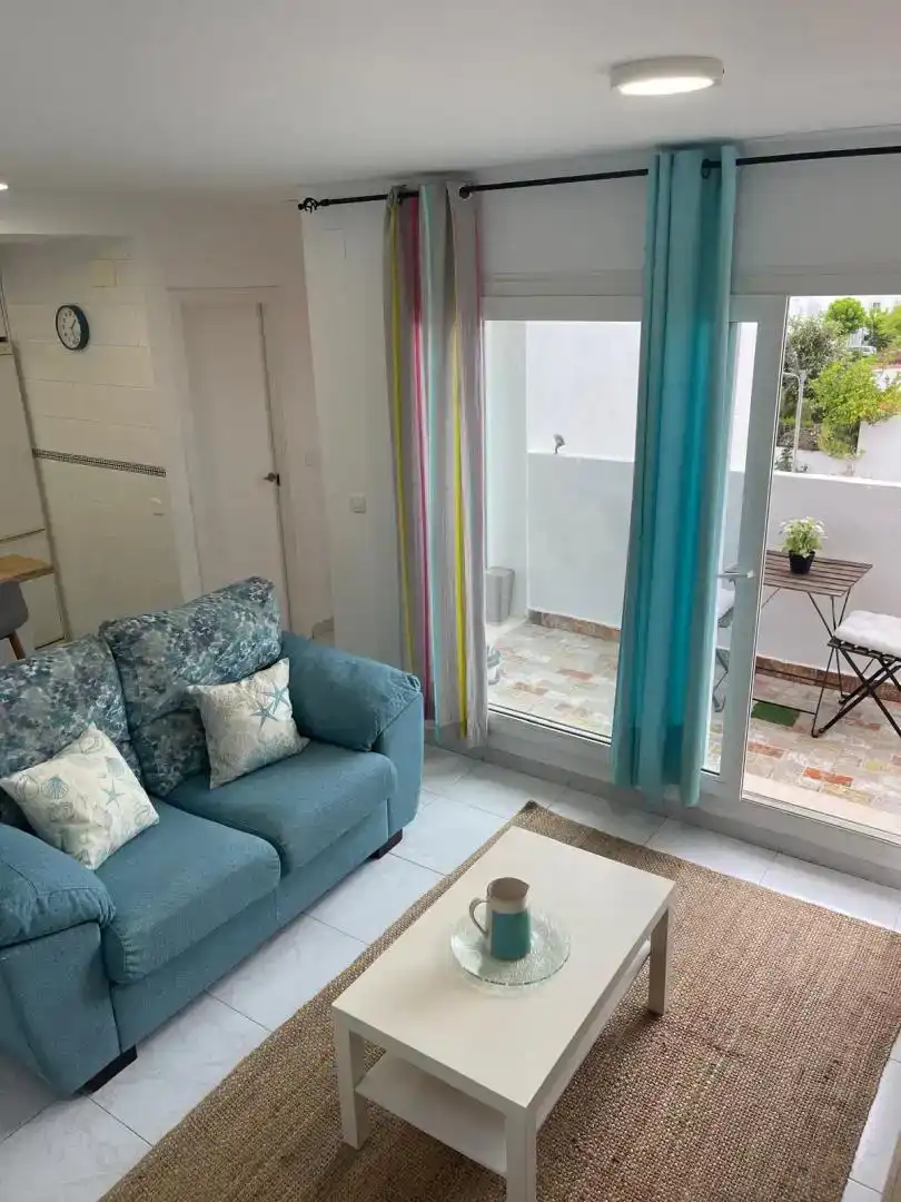 Wohnzimmer von Maisonette zur Miete in El Rompido mit Schwimmbad und Balkon