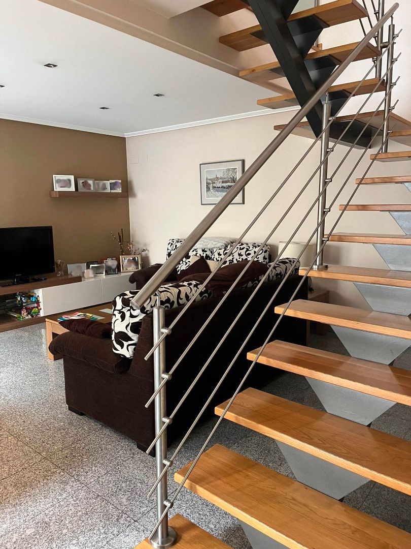 Sala d'estar de Casa adosada en venda en Tauste amb Jardí privat, Terrassa i Traster