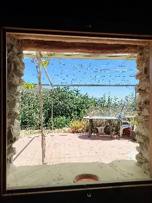 Terrassa de Finca rústica en venda en Alpujarra de la Sierra amb Calefacció, Jardí privat i Moblat